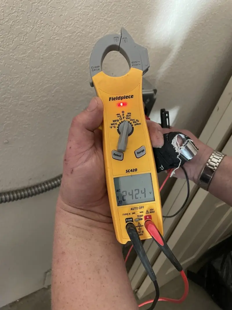 Voltage testing with clamp meter during Generator Installation in Lamont